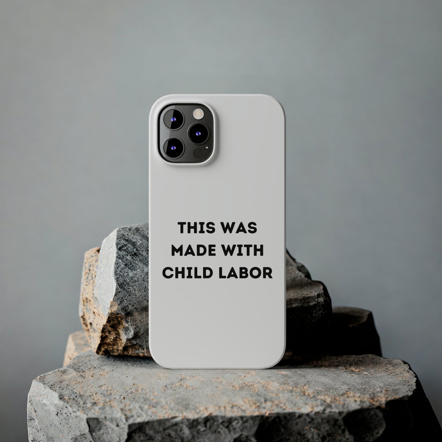THIS WAS MADE WITH CHILD LABOR iPhone Case